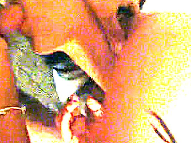 Asian babe sucks on a big large dick