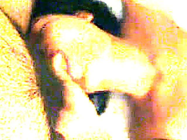 Asian babe sucks on a big large dick