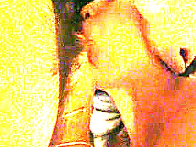 Asian babe sucks on a big large dick