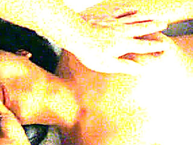 Asian babe sucks on a big large dick