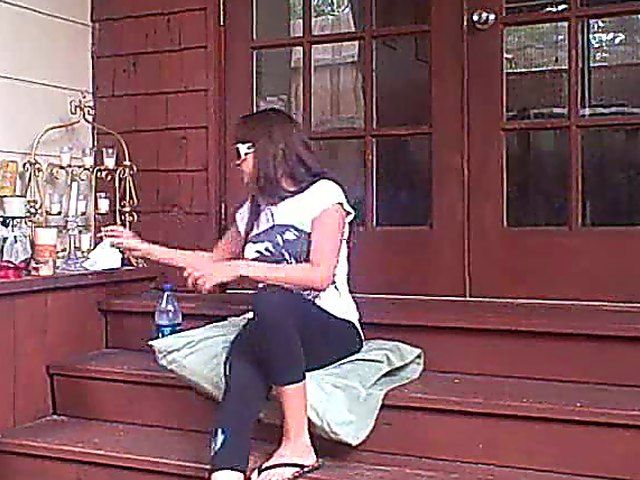 Mature brunette fucks her boyfriend on the porch