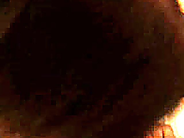 A blindfolded teen sucks on a cock