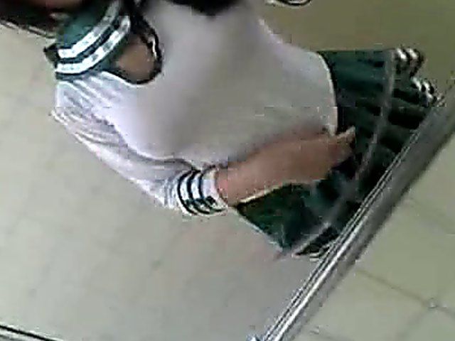 Amateur girl in sexy uniform shows her knockers