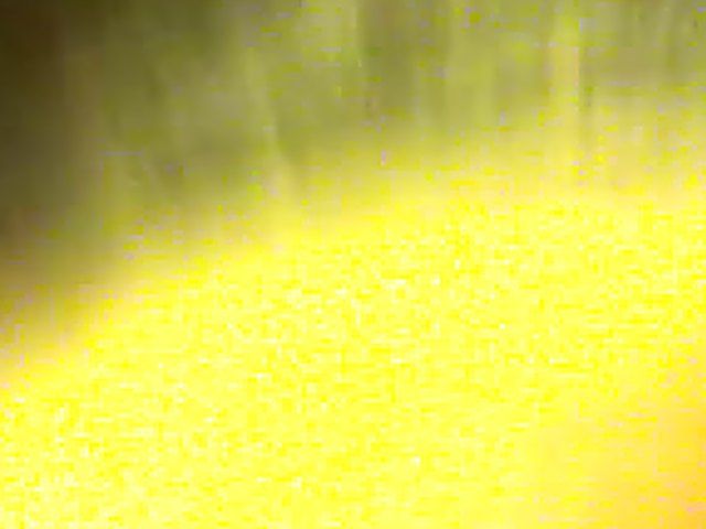 Ebony babe plays with her yellow toy