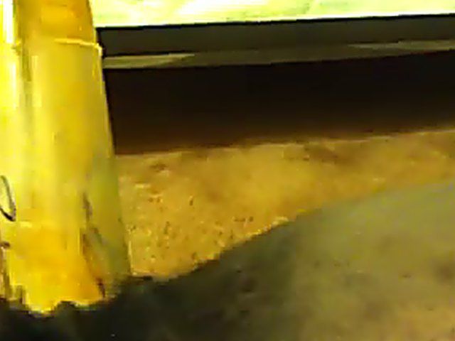 Ebony babe plays with her yellow toy