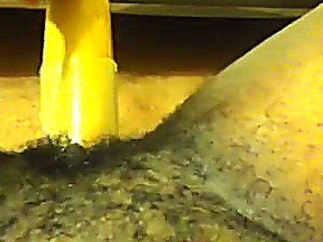 Ebony babe plays with her yellow toy