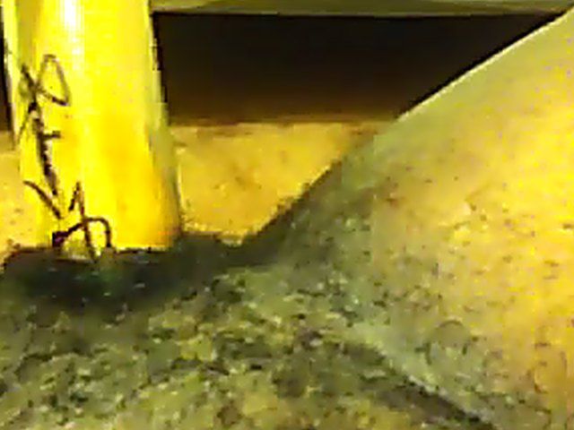 Ebony babe plays with her yellow toy