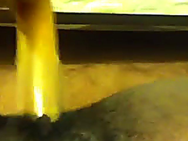 Ebony babe plays with her yellow toy