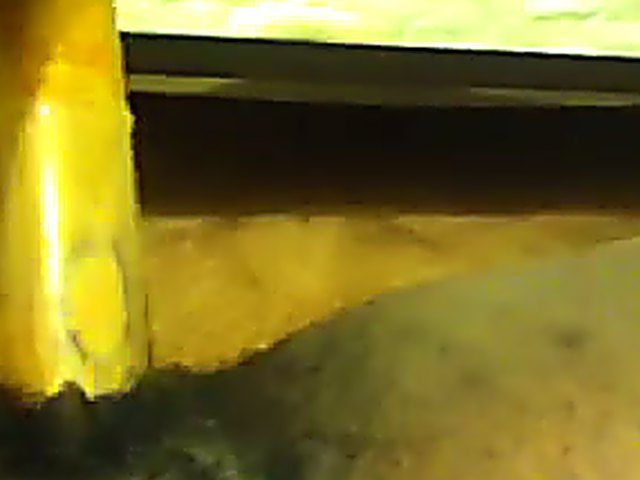 Ebony babe plays with her yellow toy