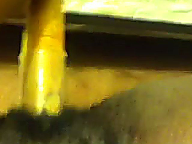 Ebony babe plays with her yellow toy