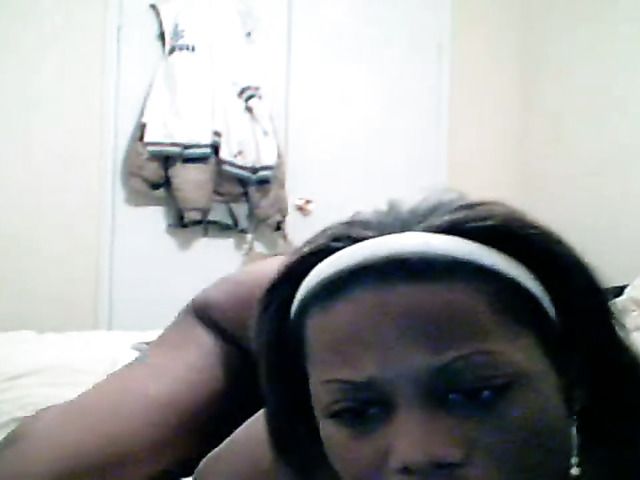 Sexy Ebony babe plays with pink dildo