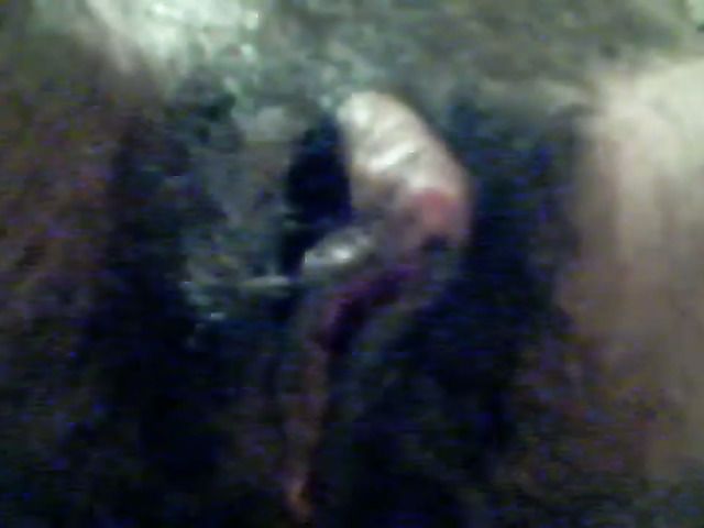 Sexy Ebony babe plays with pink dildo