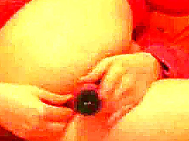 Horny woman stretches her ass hole with toys