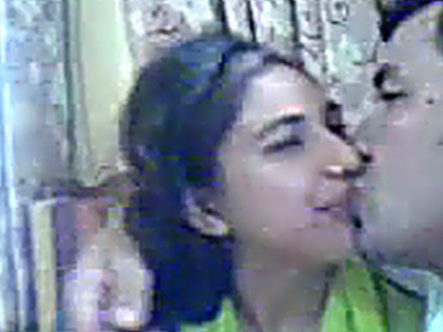 Pretty Pakistani wife kisses her handsome husband
