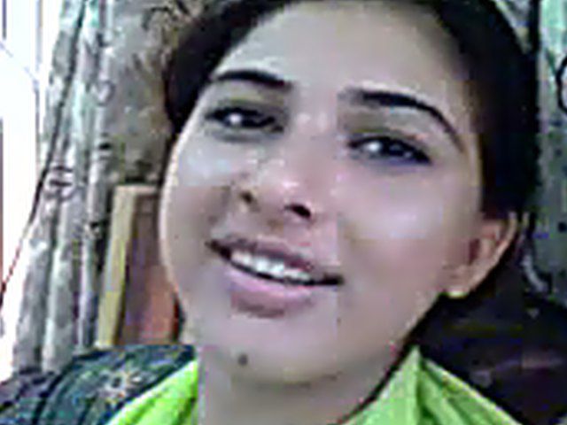 Pretty Pakistani wife kisses her handsome husband