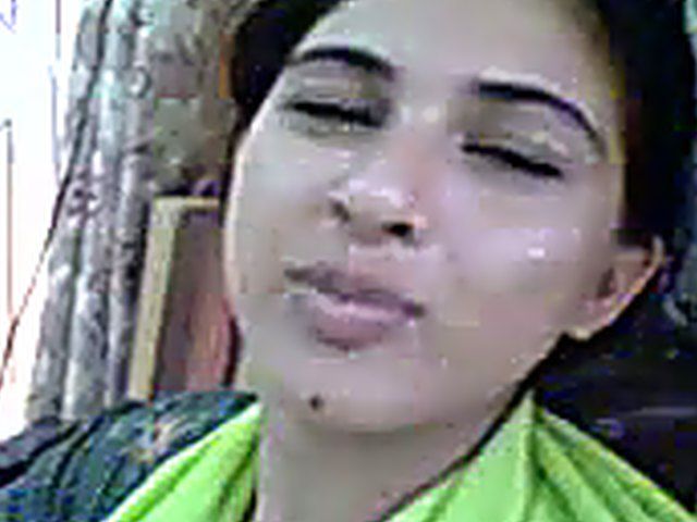 Pretty Pakistani wife kisses her handsome husband