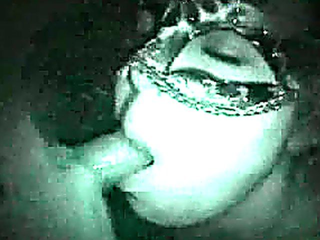 Masked babe sucks cock in a glory hole