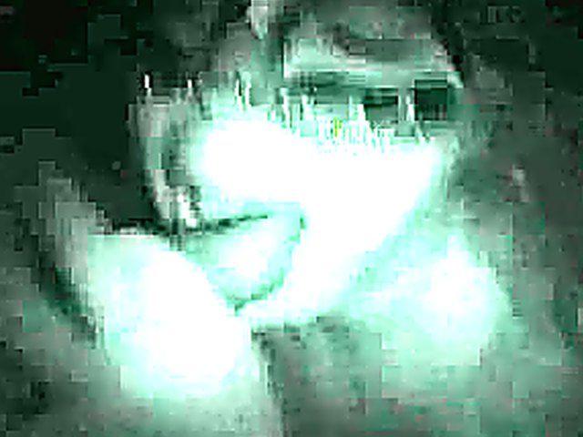 Masked babe sucks cock in a glory hole