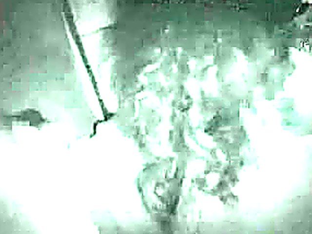 Masked babe sucks cock in a glory hole