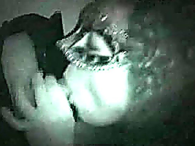 Masked babe sucks cock in a glory hole