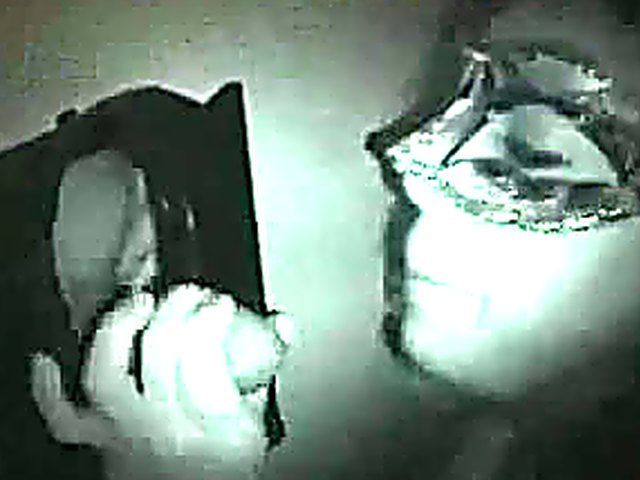 Masked babe sucks cock in a glory hole