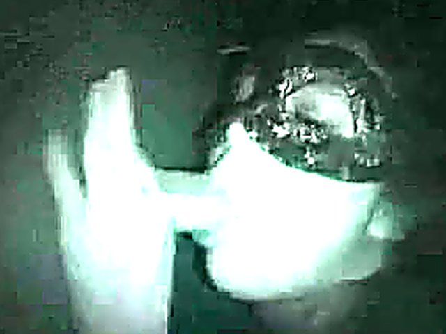 Masked babe sucks cock in a glory hole