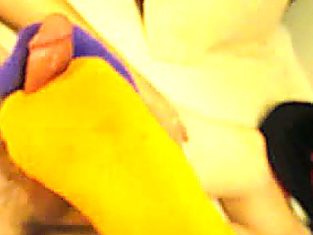 Girlfriend in color socks gives great footjob