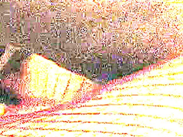 White woman in red fishnets rides big black pole