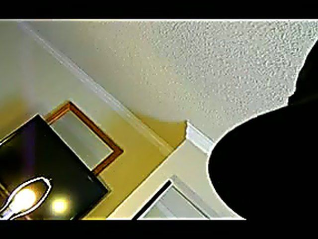 Playful woman plays with her black boyfriend's big beefy cock