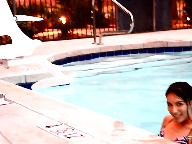 Exotic teen Melody plays with her snatch by the pool