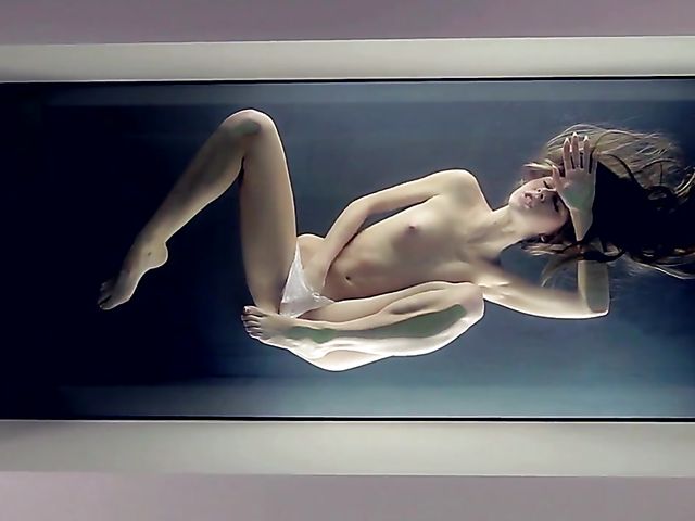 Erotic solo with a long haired babe in panties