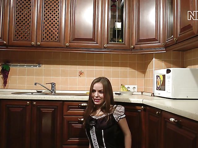 Solo strip in the kitchen during a photo shoot