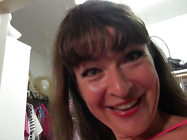 Shaved mature Belinda Brush fucks herself