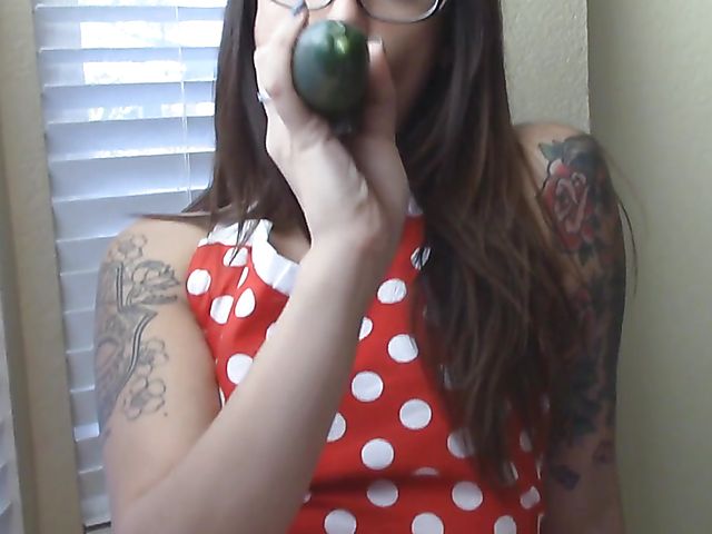 A big cucumber in Jynx's shaved pussy