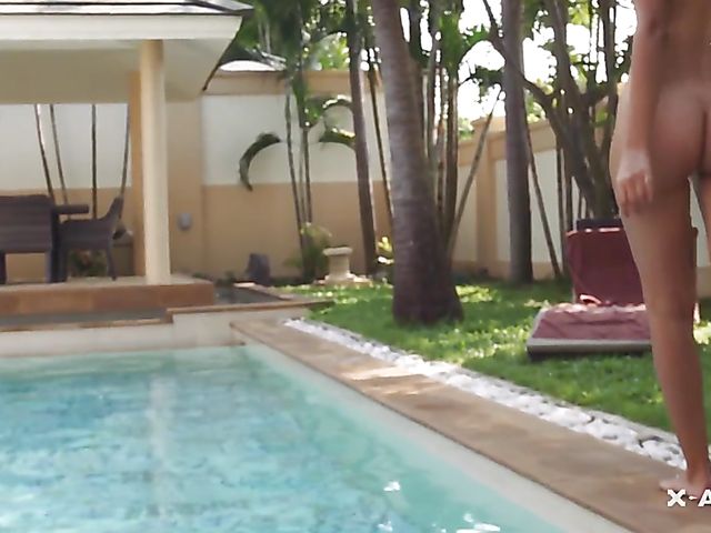 Wet teen Lillianne fingering herself in the garden