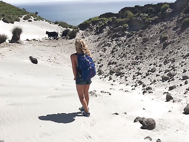 Mountain hiker Cherie DeVille wearing denim shorts