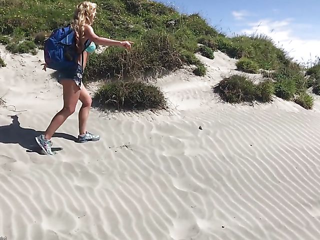 Mountain hiker Cherie DeVille wearing denim shorts