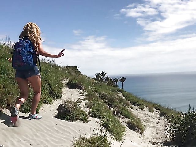 Mountain hiker Cherie DeVille wearing denim shorts