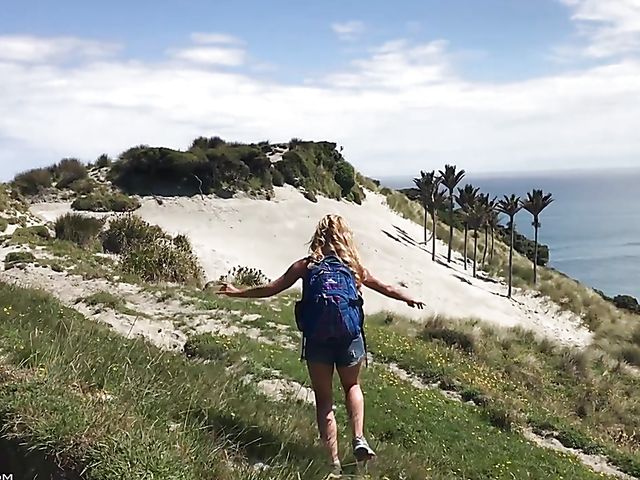 Mountain hiker Cherie DeVille wearing denim shorts