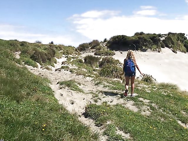 Mountain hiker Cherie DeVille wearing denim shorts