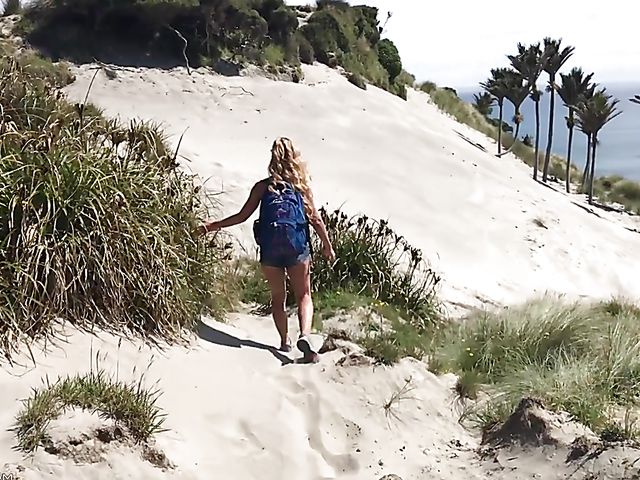 Mountain hiker Cherie DeVille wearing denim shorts