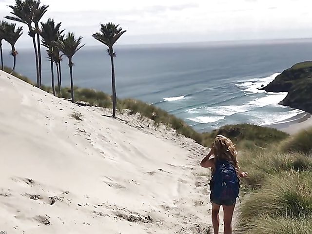 Mountain hiker Cherie DeVille wearing denim shorts