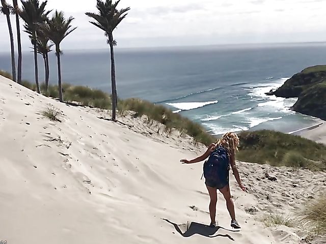 Mountain hiker Cherie DeVille wearing denim shorts