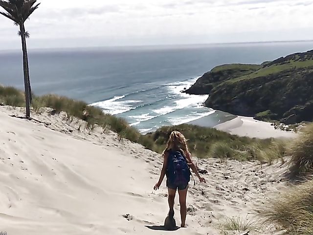 Mountain hiker Cherie DeVille wearing denim shorts