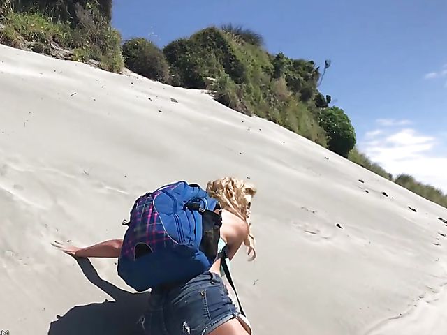 Mountain hiker Cherie DeVille wearing denim shorts