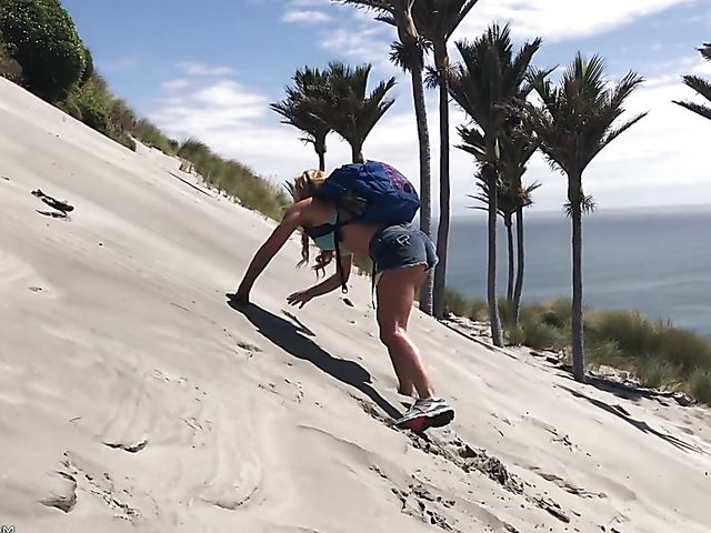 Mountain hiker Cherie DeVille wearing denim shorts