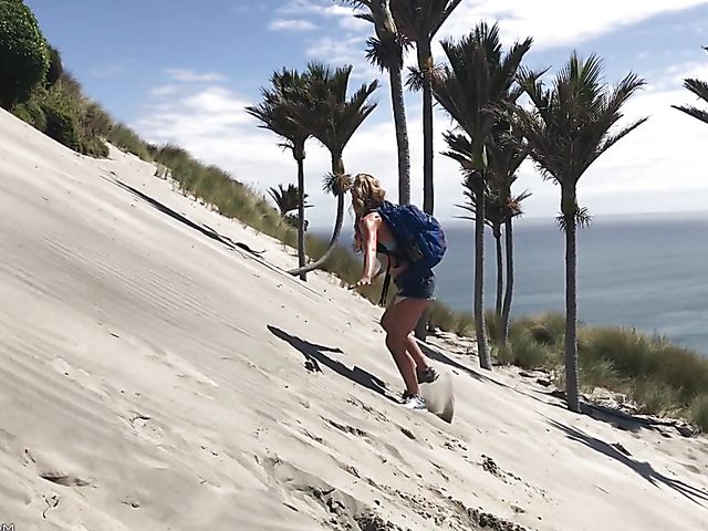 Mountain hiker Cherie DeVille wearing denim shorts