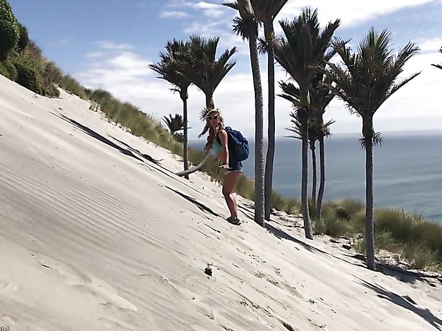 Mountain hiker Cherie DeVille wearing denim shorts