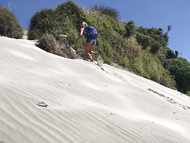 Mountain hiker Cherie DeVille wearing denim shorts