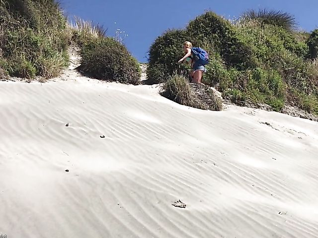 Mountain hiker Cherie DeVille wearing denim shorts